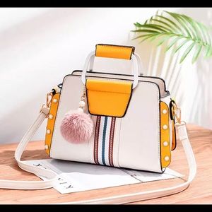 White and yellow luxury leather purse